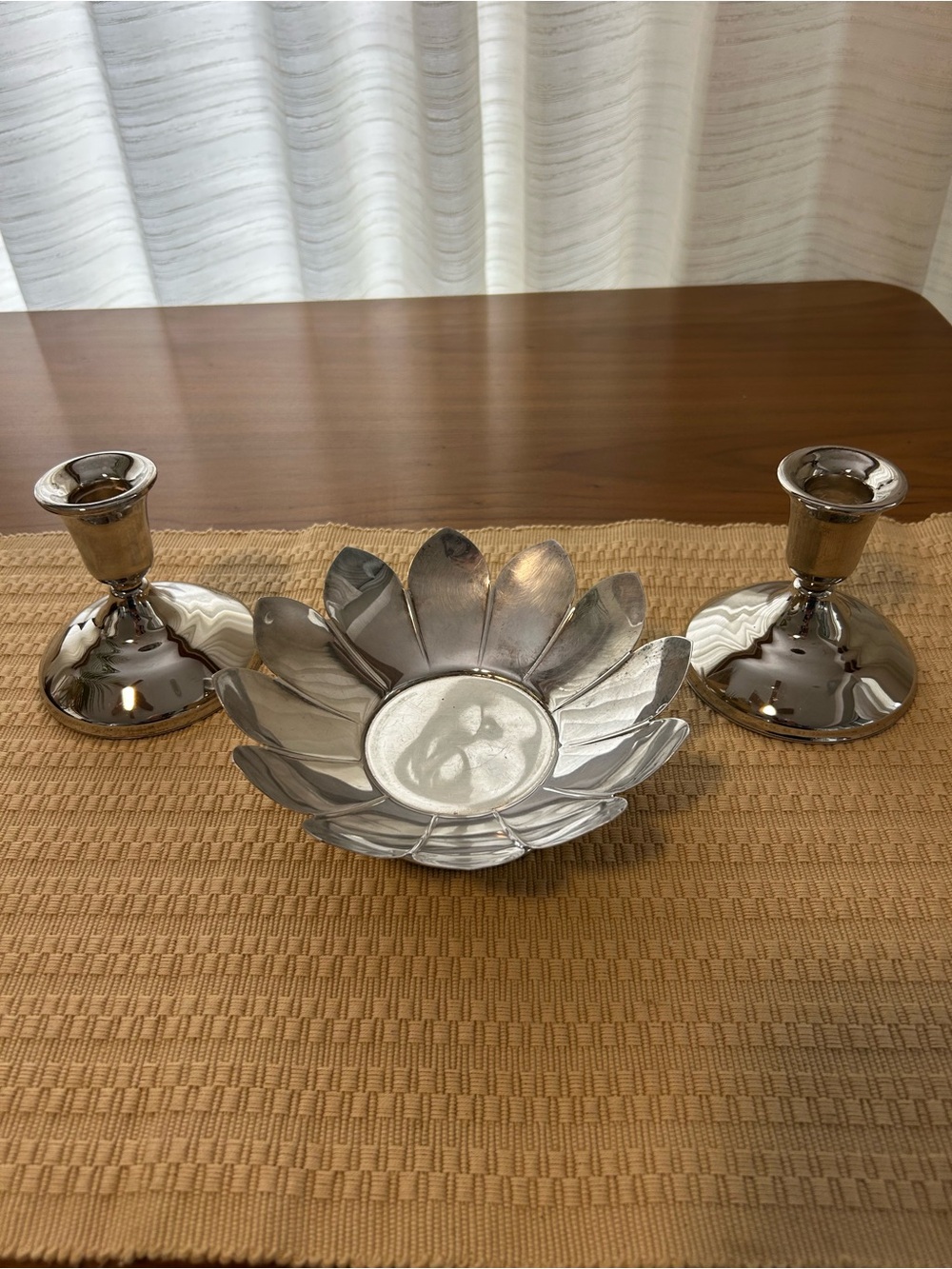 3 piece silver plate. Flower petal bowl on pedestal and 2 candle holders